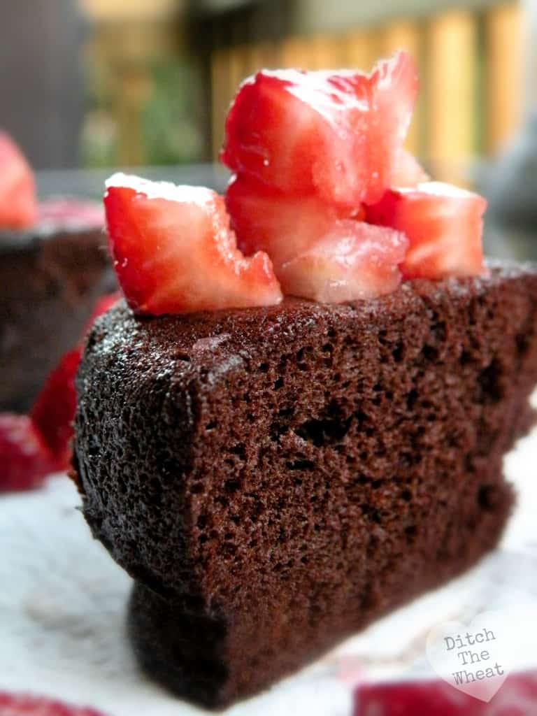 THE BEST FLOURLESS Chocolate Mug Cake cut in half to show how fluffy it is.