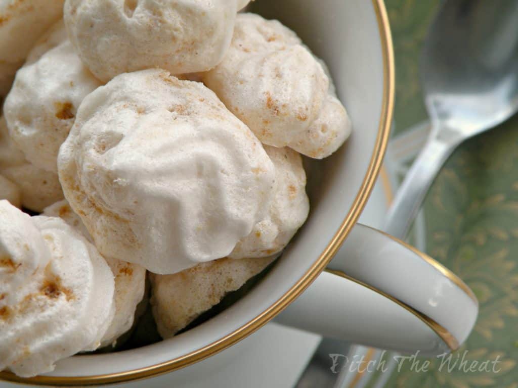 Pumpkin meringue cookies in a tea cup.