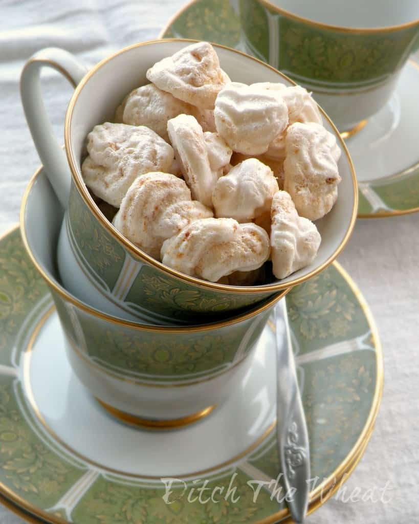 Pumpkin meringue cookies in a tea cup.