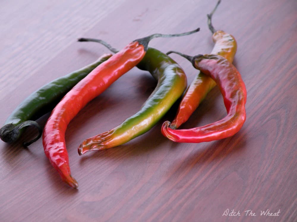 Hot peppers on a wooden table.