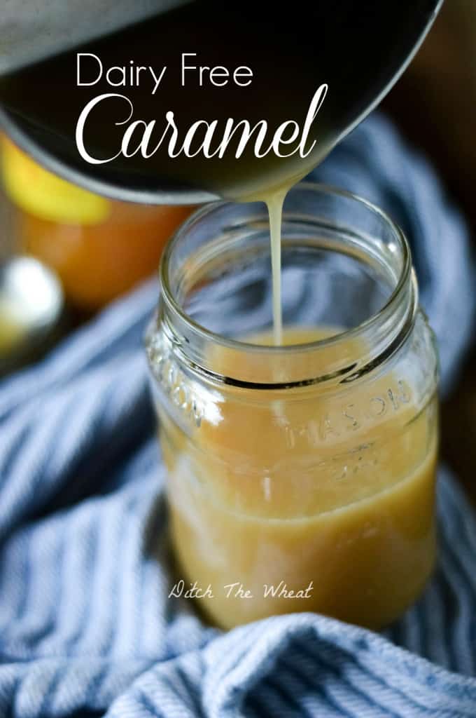 Dairy free caramel sauce being poured into a mason jar.