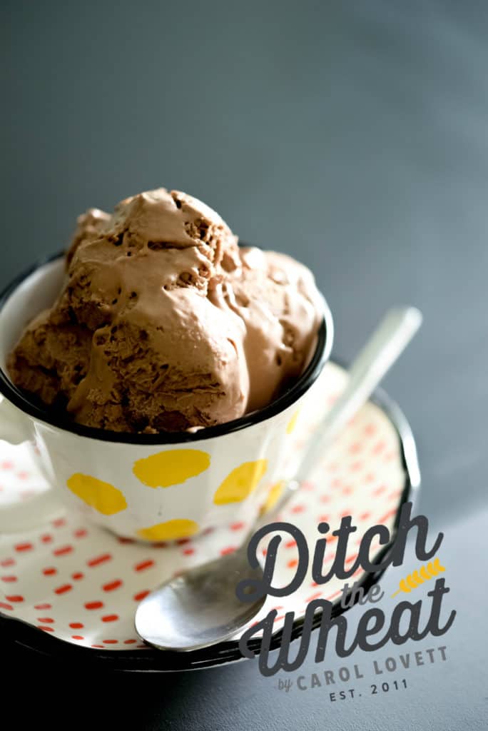 Scoops of dairy free chocolate ice cream in a tea cup. 