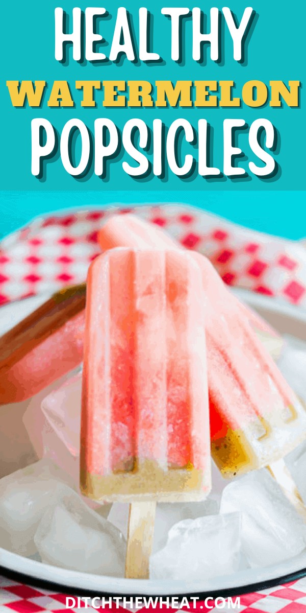 Four healthy watermelon popsicles over ice on a pie plate with red checkered paper in the background.