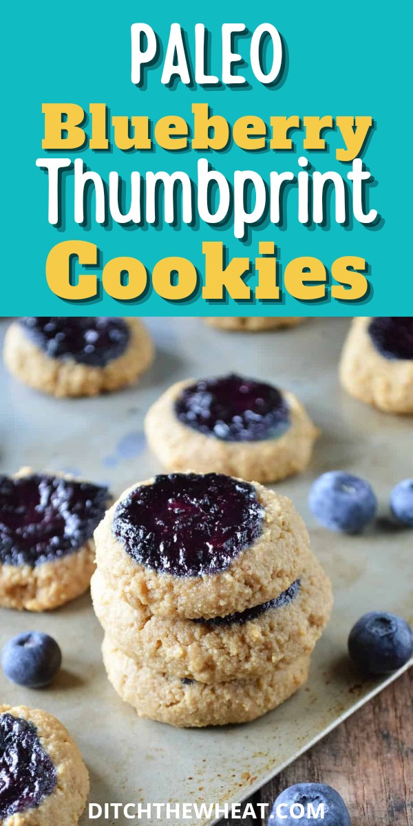 A stack of almond flour thumbprint cookies with blueberry jam.