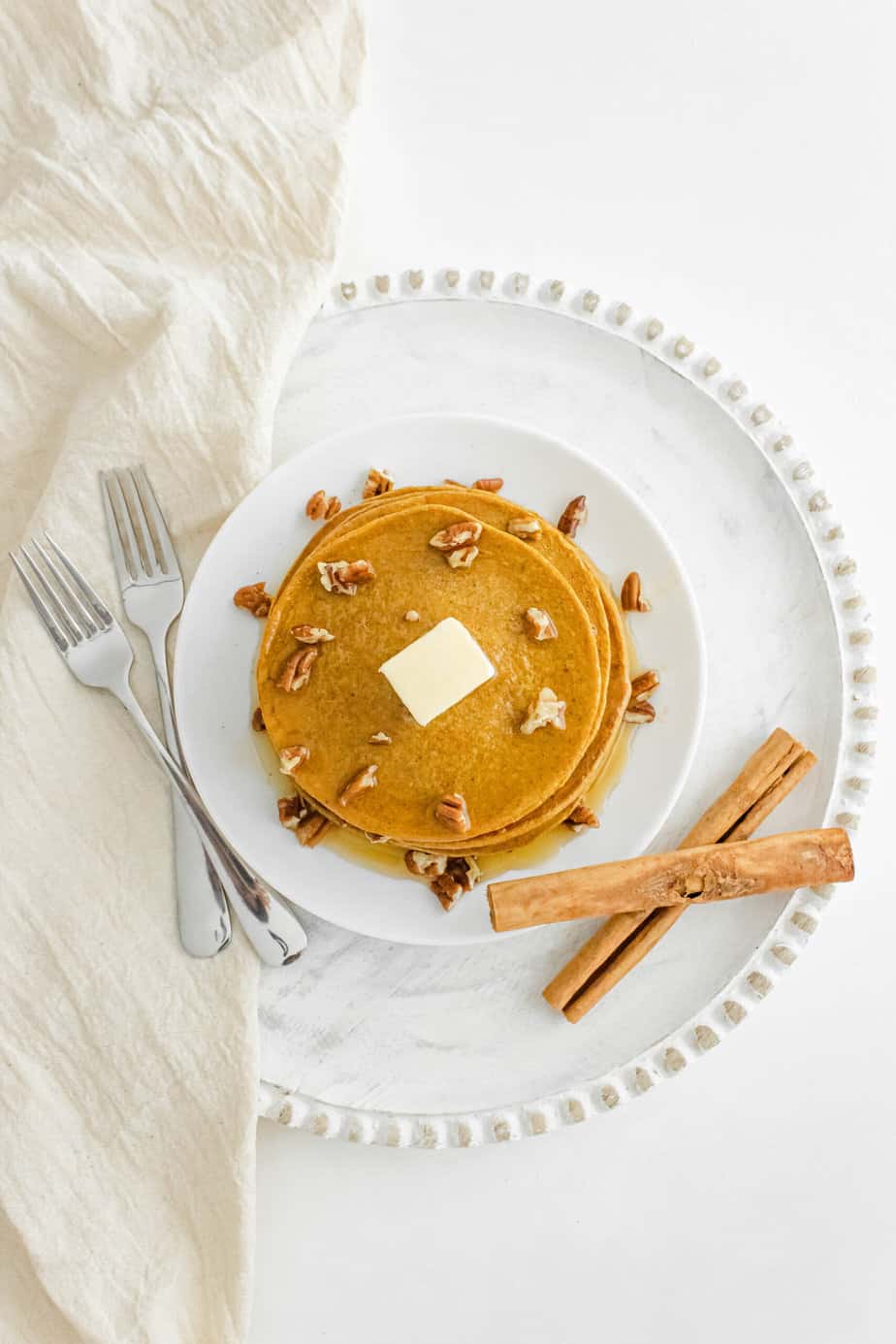 Pumpkin oatmeal pancakes on a plate. 