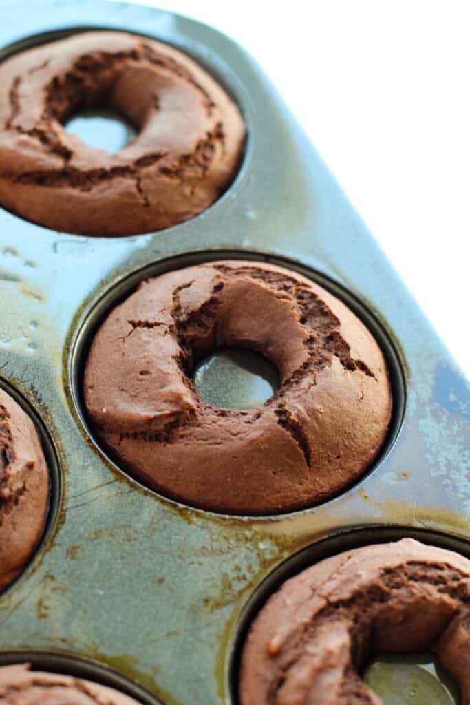 Baked gluten free chocolate donuts.