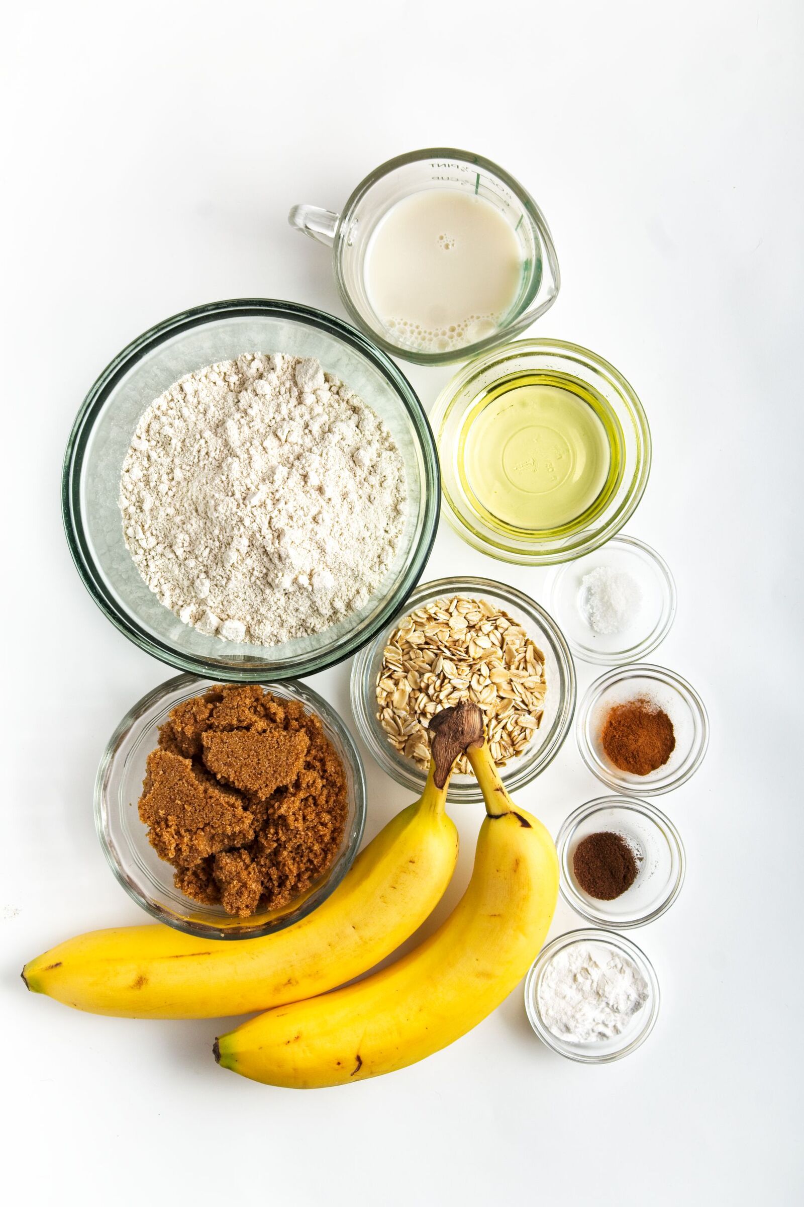 Oat Flour Banana Muffin ingredients in bowls.