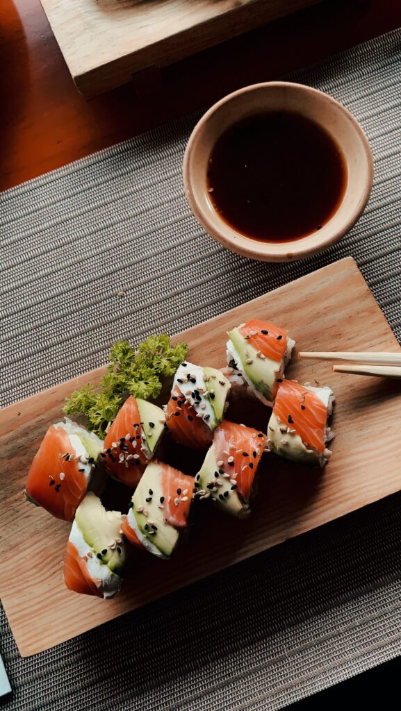 Are Sesame Seeds Gluten Free? Sushi on a platter with soy sauce.