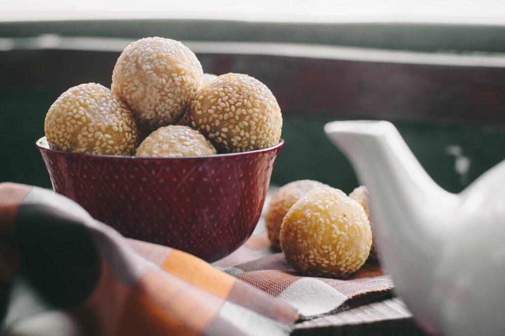 Are Sesame Seeds Gluten Free? Sesame seed balls in a bowl.