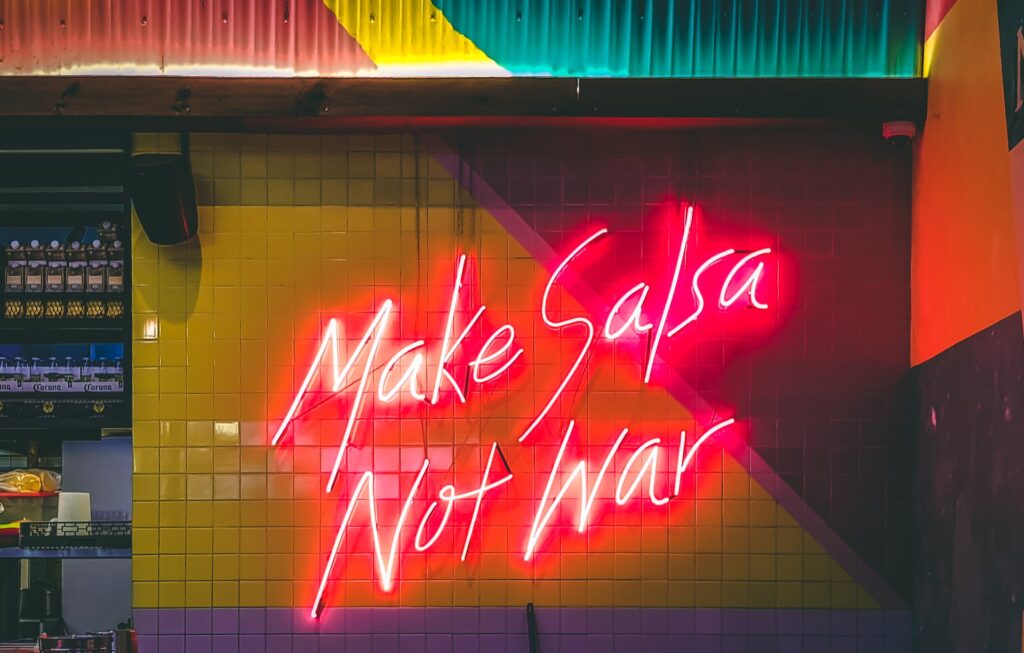 Is Salsa Gluten Free? A sign that says make salsa, not war.