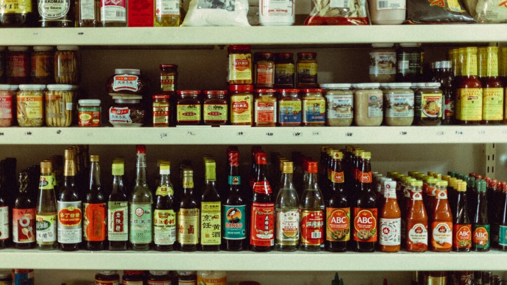 Is Sesame Oil Gluten Free? A shelf of Asian condiments.