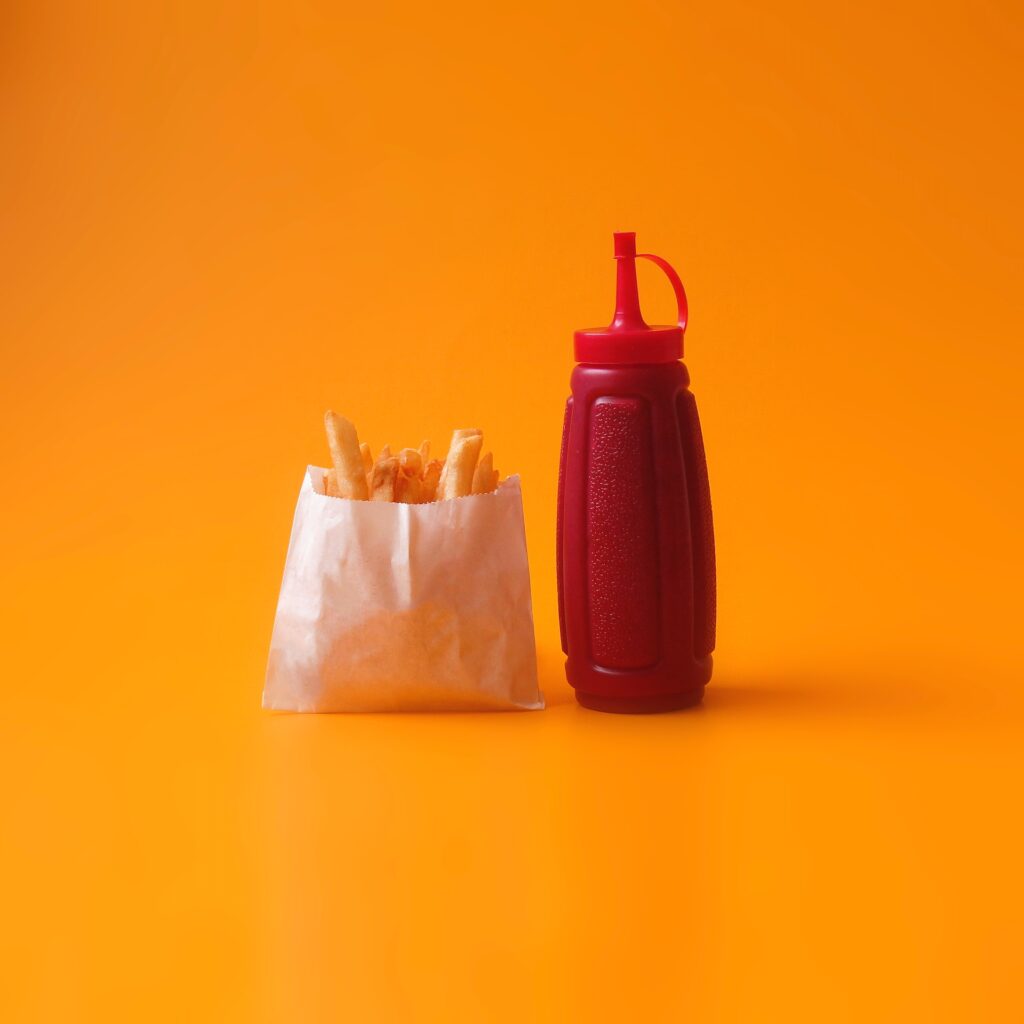 Is ketchup gluten free? A bottle of ketchup and fries.