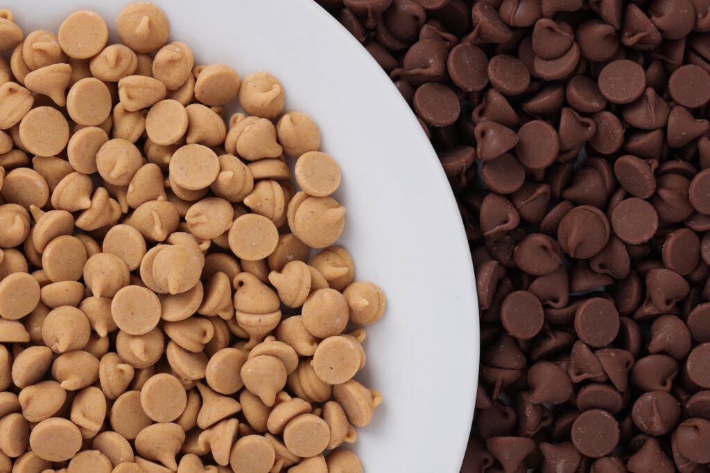 Are Chocolate Chips Gluten Free? One bowl of butterscotch chips and one bowl of chocolate chips.