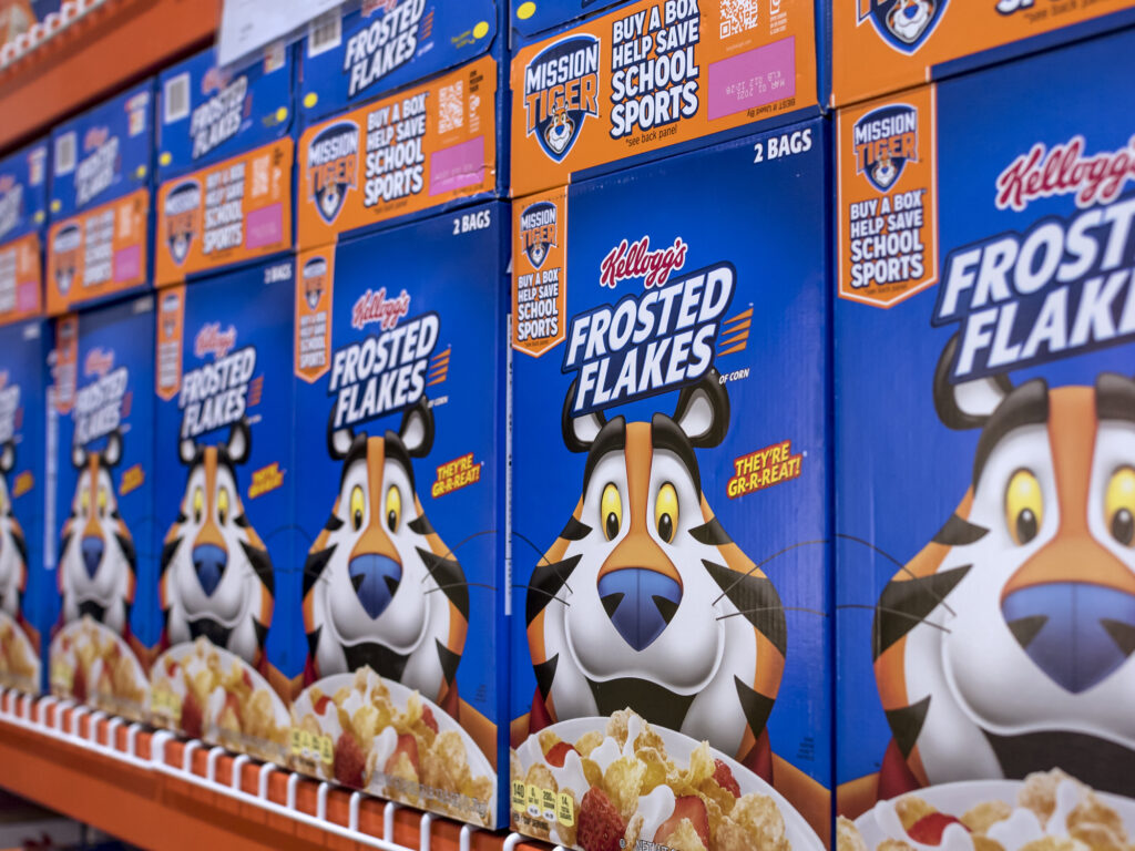 Are Frosted Flakes Gluten Free? A row of Frosted Flakes boxes.