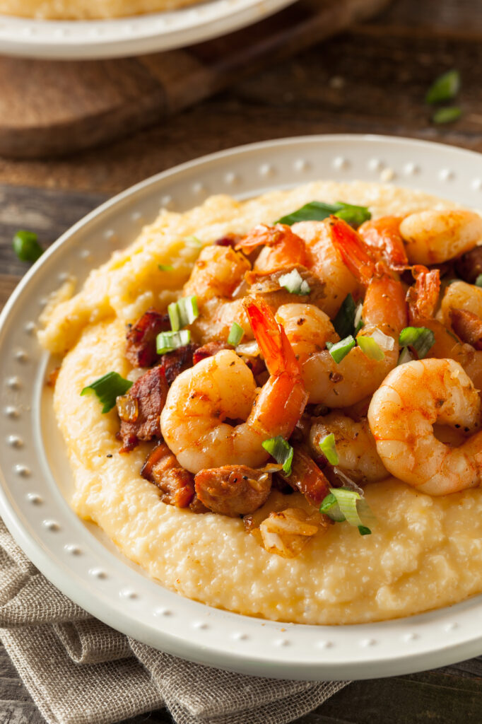 Are Grits Gluten Free? A bowl of grits with shrimp.