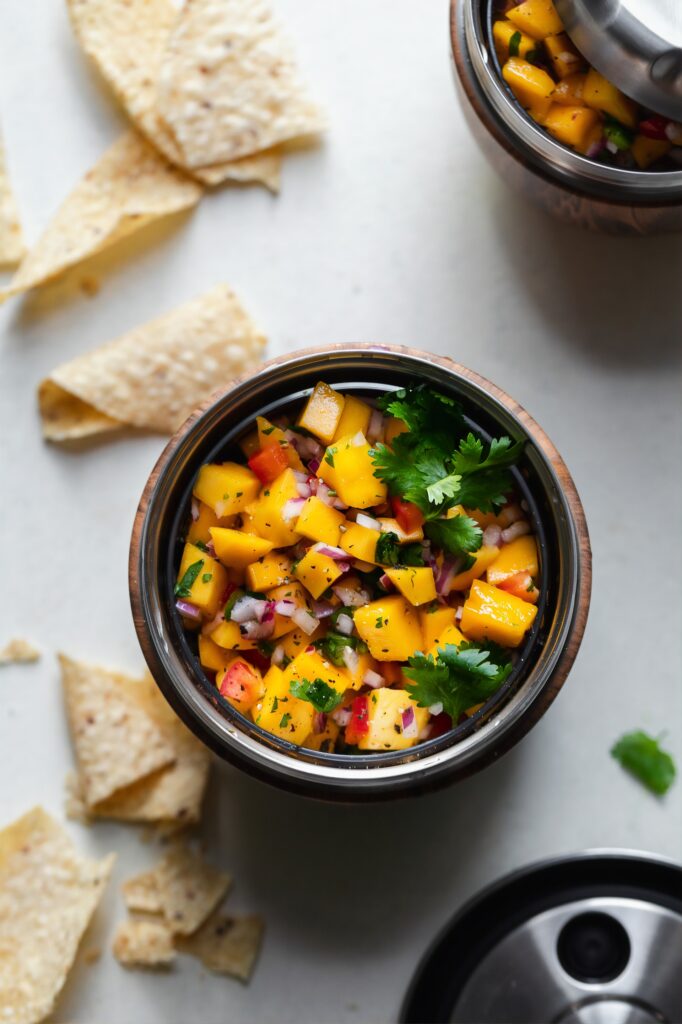 Gluten free lunch ideas for kids. A container with salsa and tortilla chips.