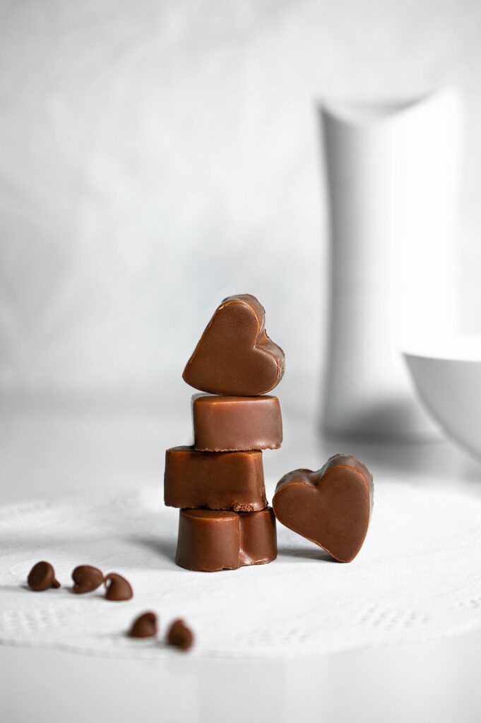 Is Milk Chocolate Gluten Free? A few heart-shaped milk chocolate candies.
