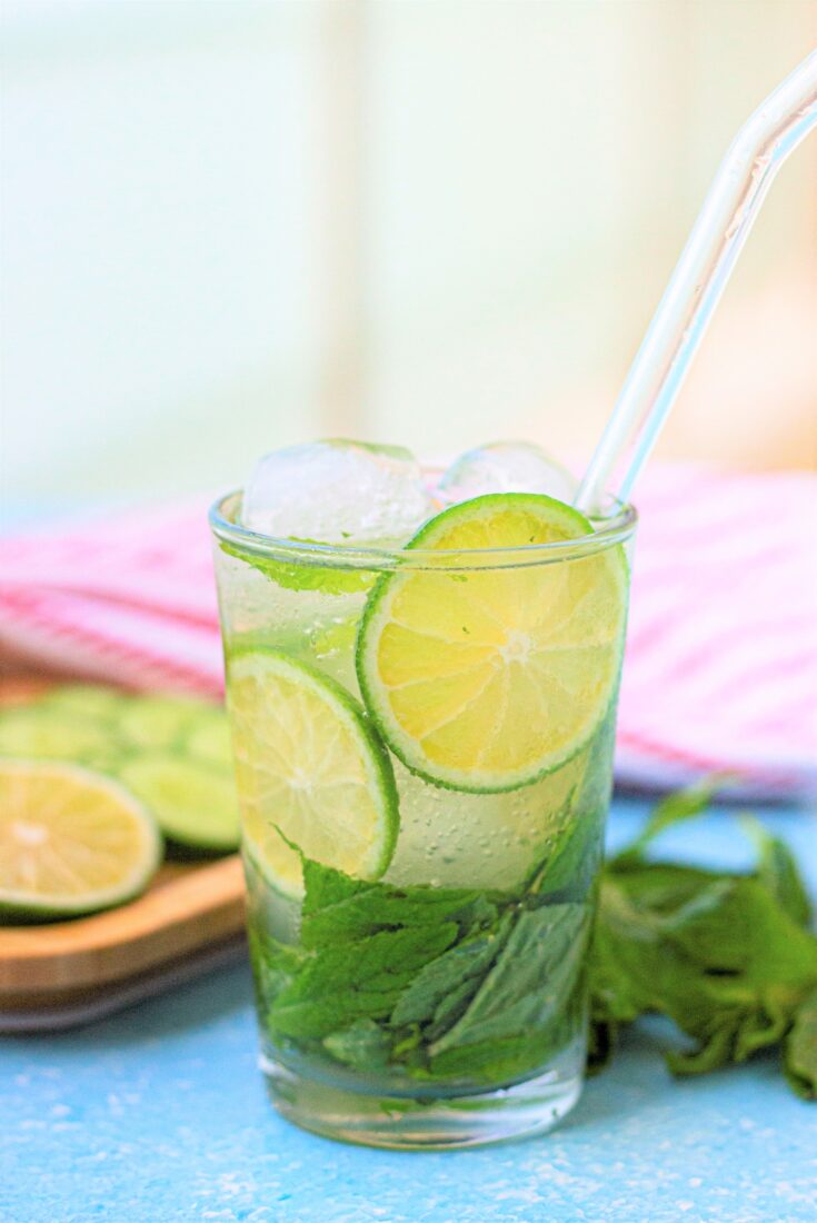 Lime and cucumber water in a glass.