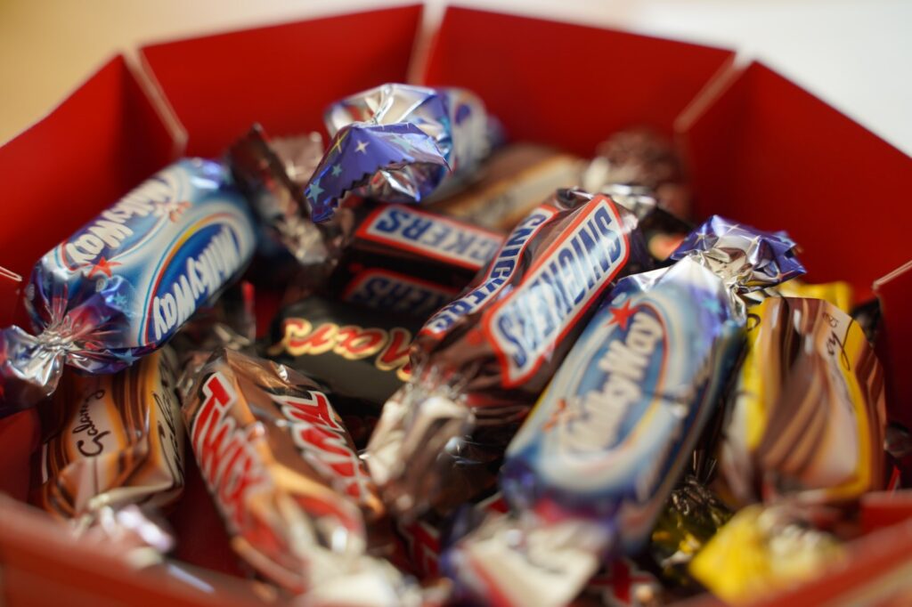 A bowl of Halloween candy that is not gluten free.