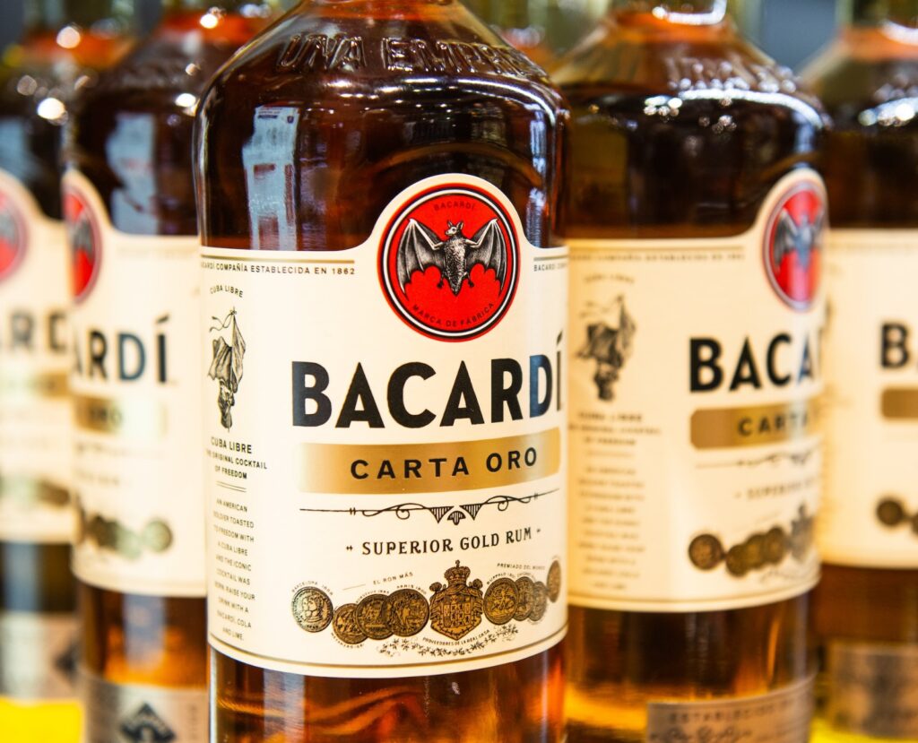 Three bottles of Bacardi rum.