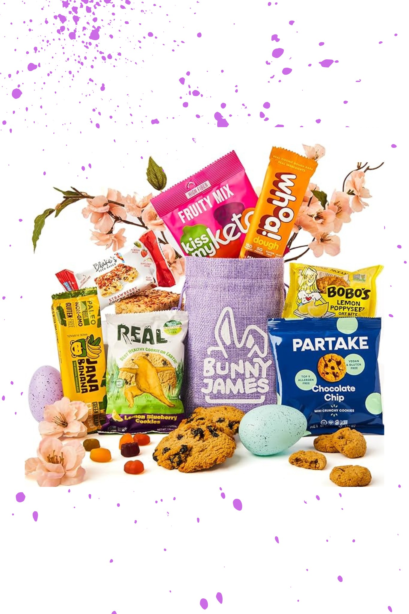 A purple bag with an Easter bunny on it with various gluten free Easter treats around it.