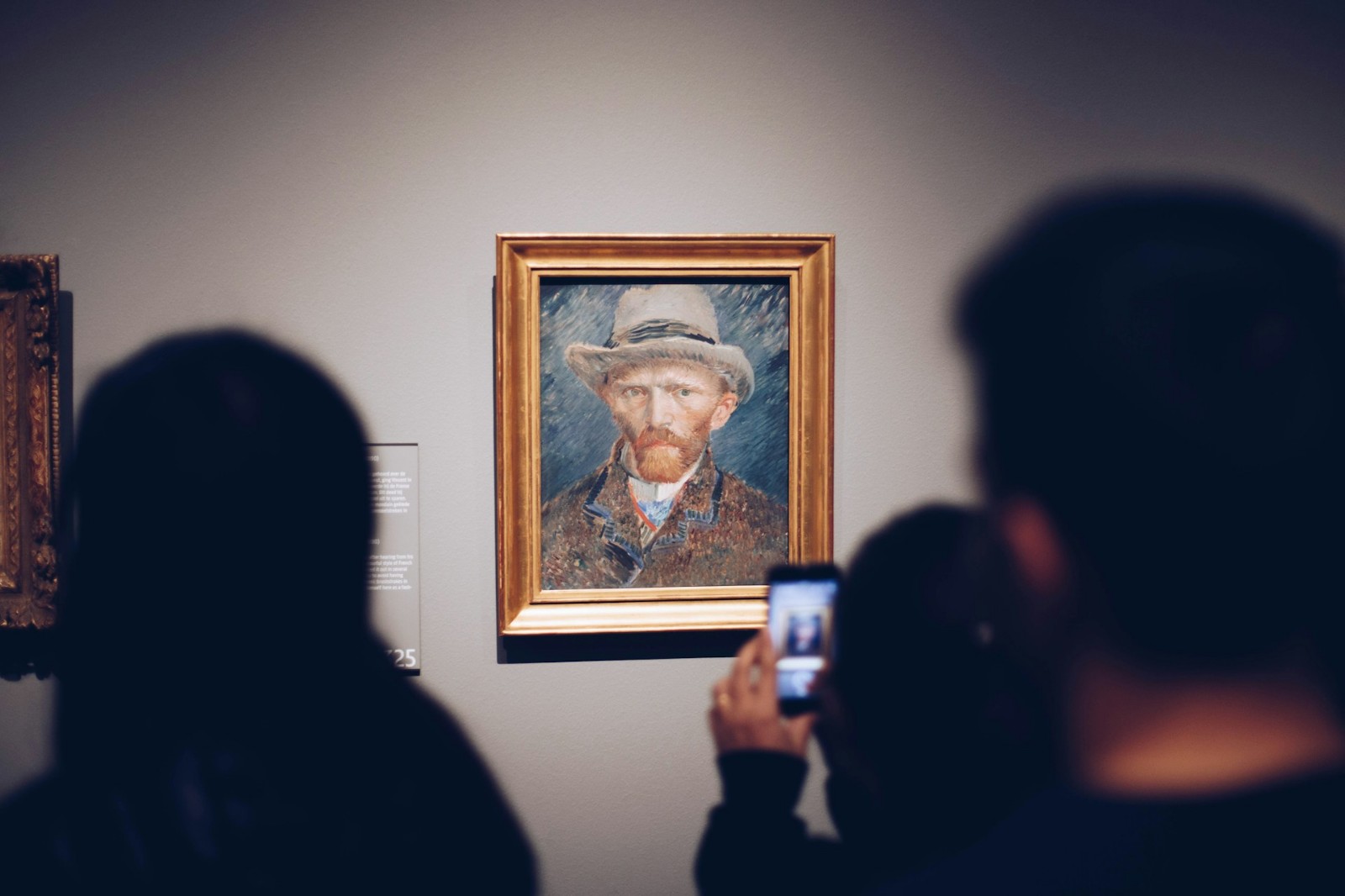 A painting of Vincent Van Gogh at a museum.