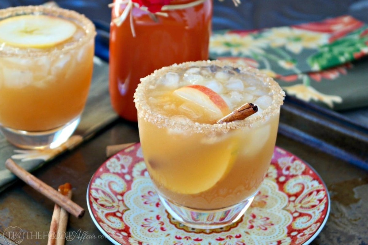 A glass filled with apple cider margarita. 